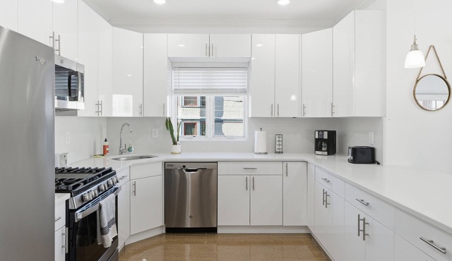Massive 4-bedroom, 3-bathroom duplex apt with garage parking in Jersey City