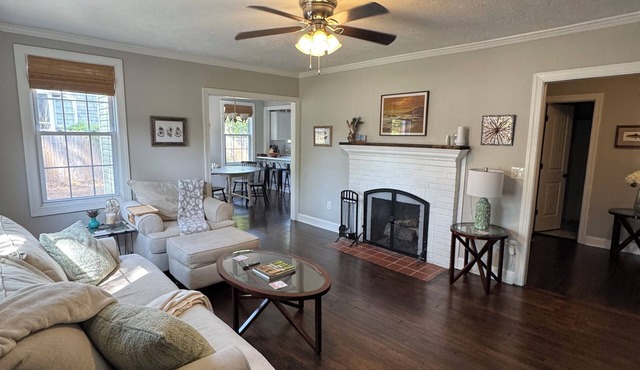 Masters rental with spacious back porch, fenced in yard, and park frontage.