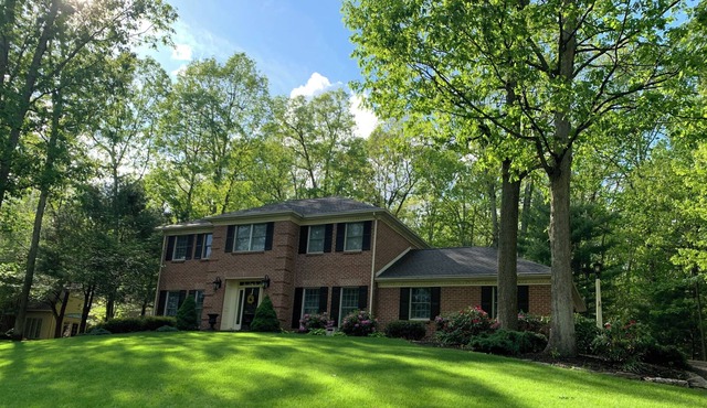 Modern colonial home with hot tub and fire pit close to Penn State