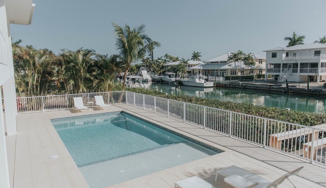 Modern Island Luxury | 4 En-Suite Masters, 6 BA, Pool, Dock & Outdoor Oasis