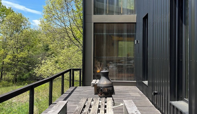 Modern Mountain House in small walkable hamlet with a view surrounded by nature.
