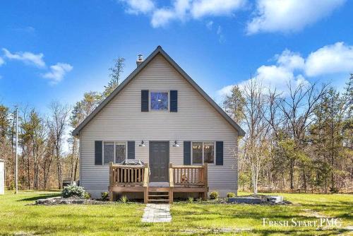 Peaceful Cabin with Direct Snowmobile & ORV Trail Access Near Caberfae Peaks in Wellston, Michigan