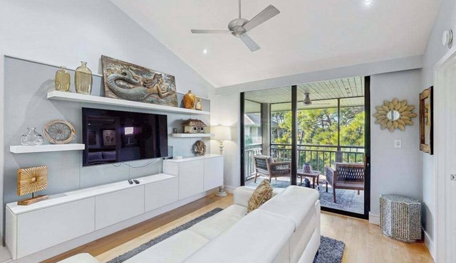 Peaceful top floor condo with golf views and resort amenities