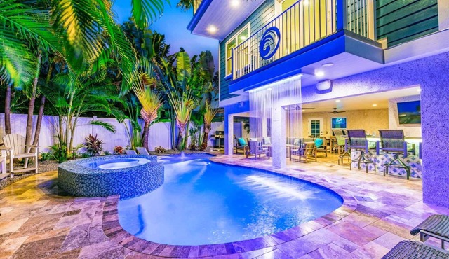 Perfect Location. Roof Top Deck. Gulf Views. Heated Pool/Spa w/Rain Curtain