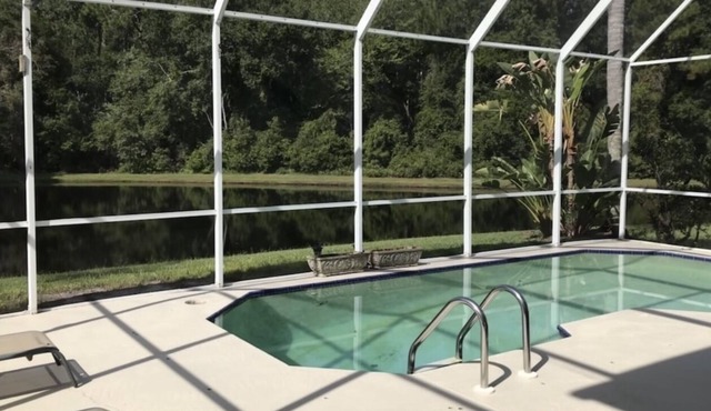 Perfectly placed by-beach & city 4 bd 2.5 b pool w pond & preserve view