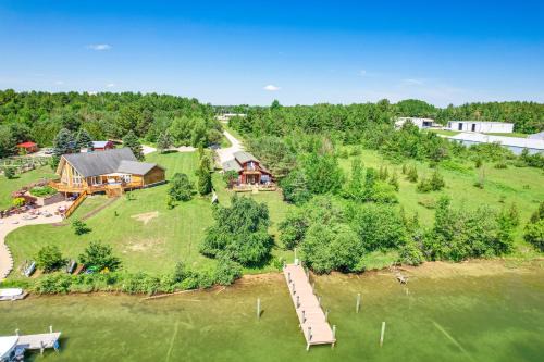 Riverfront Cheboygan Home w/Dock ~ 4 Mi to Town!