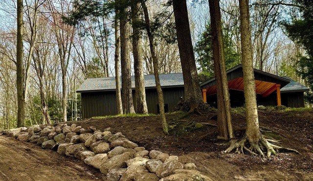 Riverfront Serenity, Rustic Charm and World Class Fishing on the Muskegon River.