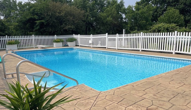 Rustic Luxury at Our Glamping Trailer Hideaway with Heated Pool