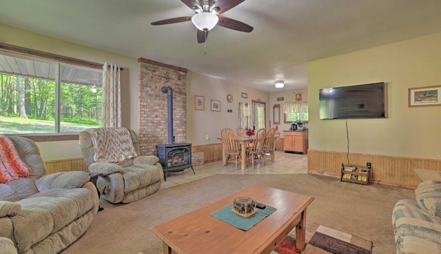 Rustic Wooded Retreat with Fire Pit, Near Trails!