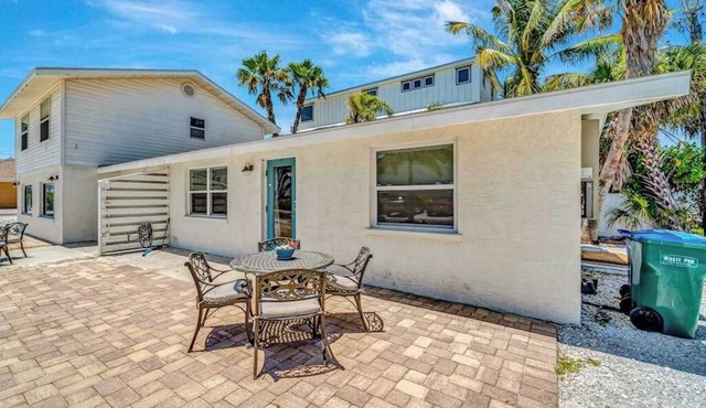 Serene oceanfront suite with Gulf view, grill, patio, central AC, & WD