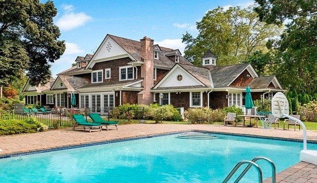 Spacious Hampton style house with giant indoor basketball court.