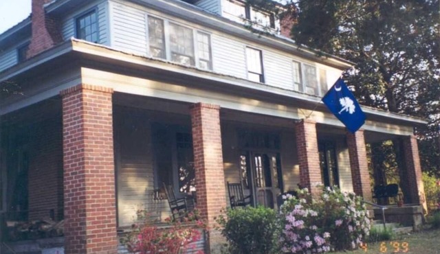 Stately 2-story historic home maintains original charm and charater.