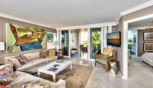Steps to the beach w/a beautiful pool view CL0101