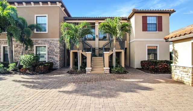 Stunning 2nd floor condo at Esplanade Golf & Country Club - Golf Included - Wait N Sea
