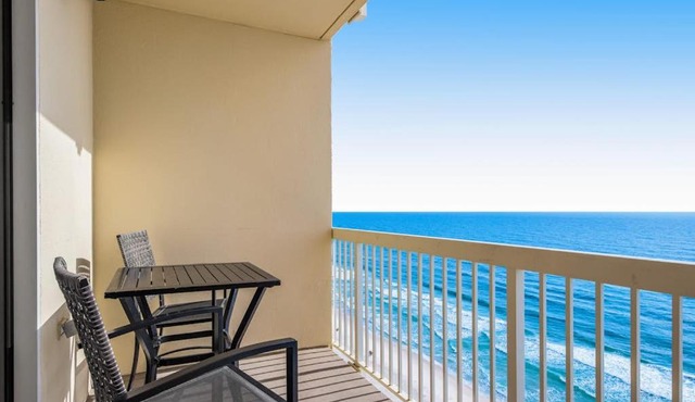Sunny oceanfront condo with two shared pools hot tub - walk to the beach