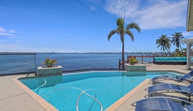 The River View 1008 - SE Cape Coral Riverfront Luxury Pool Home Pool Table and more