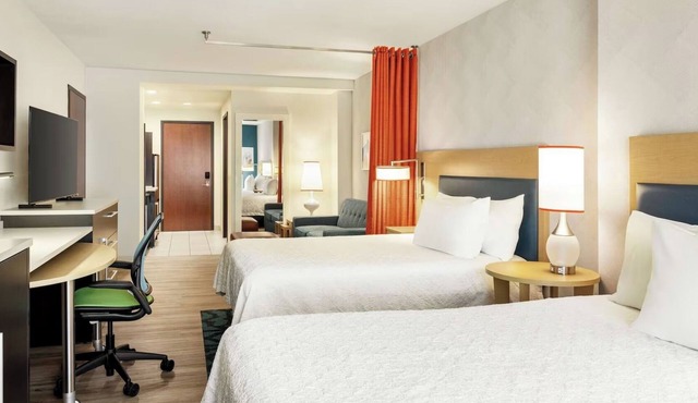 Three Bright 2 Queen Studio Suites Offering Spacious Comfort and Welcoming Vibes