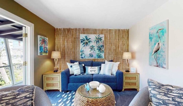 Tropical Palm Island home steps from the beach with grill, outdoor shower, dock