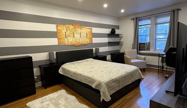 Two Large Cozy Bedroom Condominium that is 20 mins train ride to Manhattan