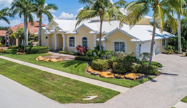 Waterfront 4BR, 4BA Marco Island home with heated pool and Wi-Fi.