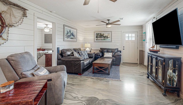 Waterfront charmer with two docks, boat ramp, office, & gourmet kitchen