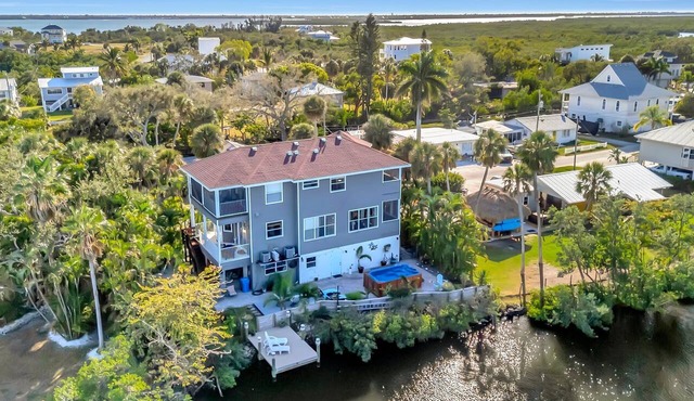 Waterfront Mansion Sleeps 9 | Hot Tub & Kayaks!