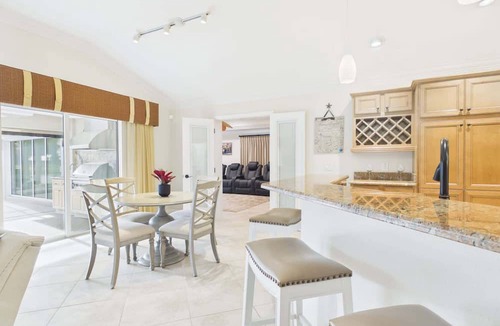 Gilchrist Villa | Luxury Golf & Waterfront Retreat with Golf Cart