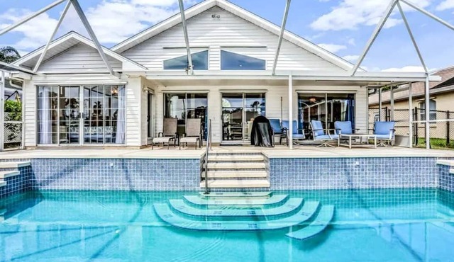 Canal Front Home with Saltwater Pool & Relaxing Lanai in Palm Coast, Florida